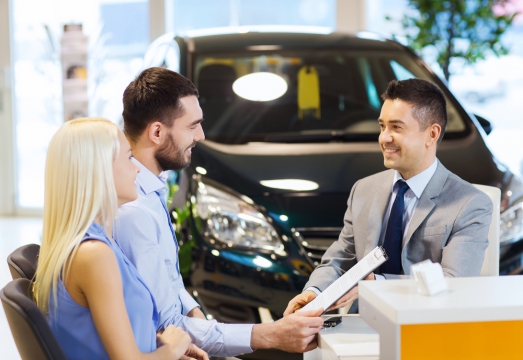 couple buying a car