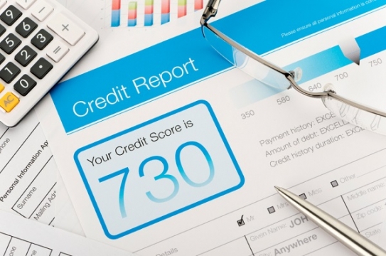 Credit report with score on a desk